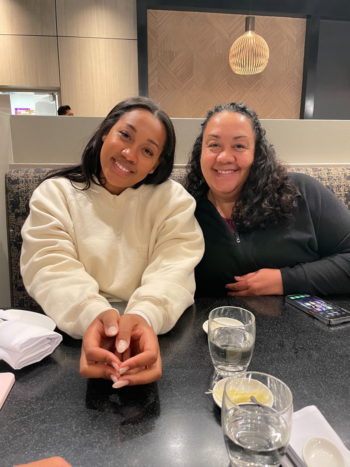 Alexis with family at dinner